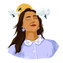 Woman with eyes closed, basking under the sun