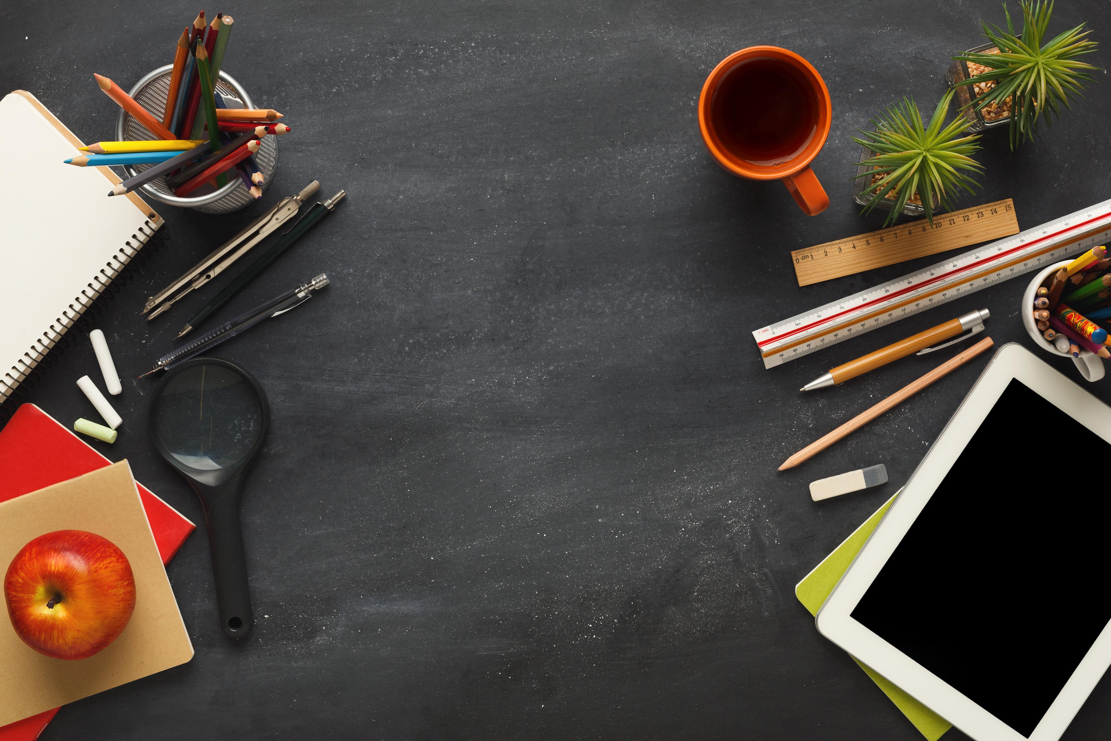 Picture of pencils, rulers, notepads and and Ipad