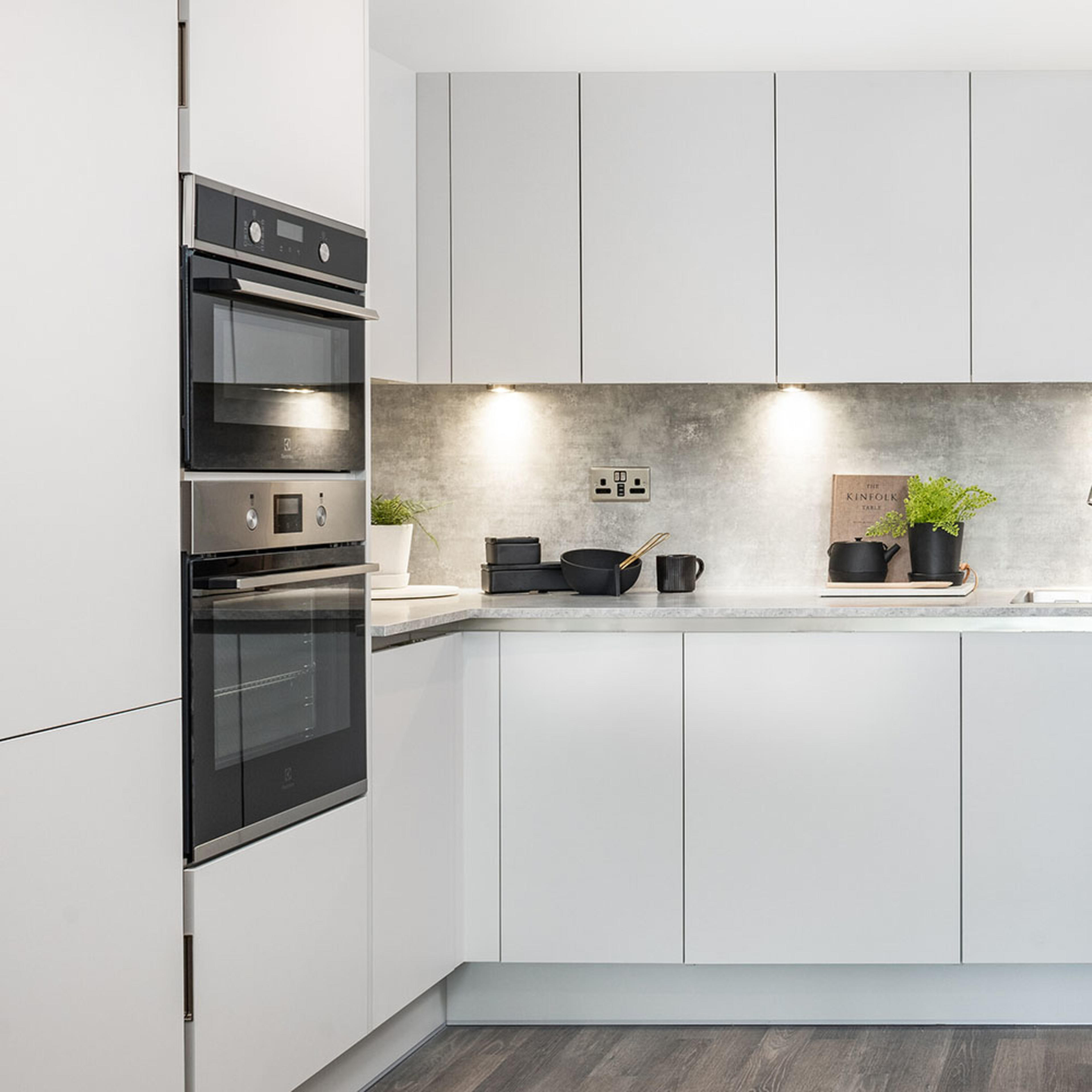 persona-homes-specification-kitchen-double-oven-white-units-wood-floor