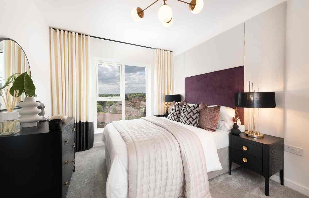 CGI of double bedroom with purple headboard, dark wood chest of drawers and bedside tables, and full height windows