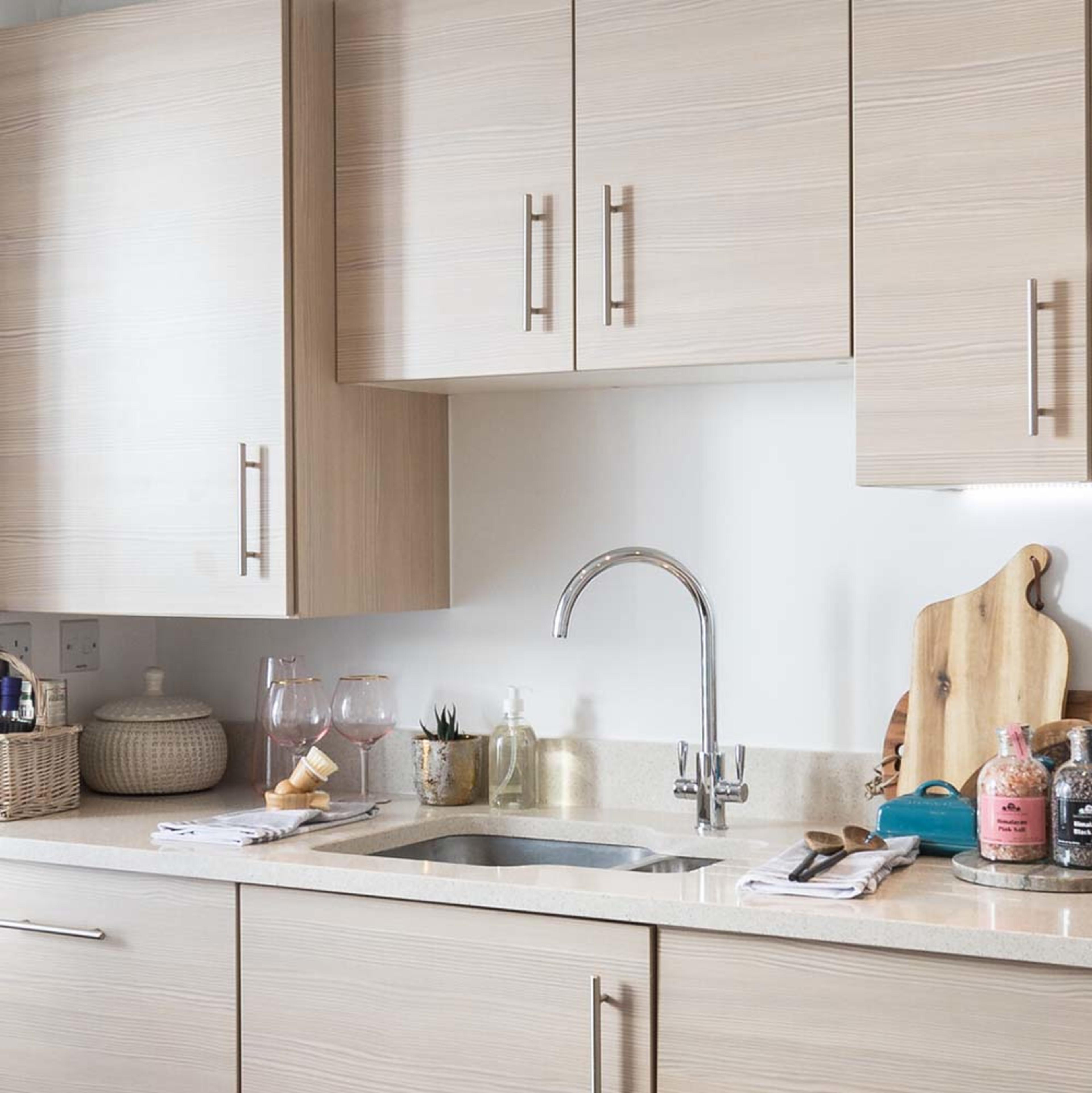 persona-homes-specification-kitchen-pale-wood-units-quartz-workstop-sink-tap