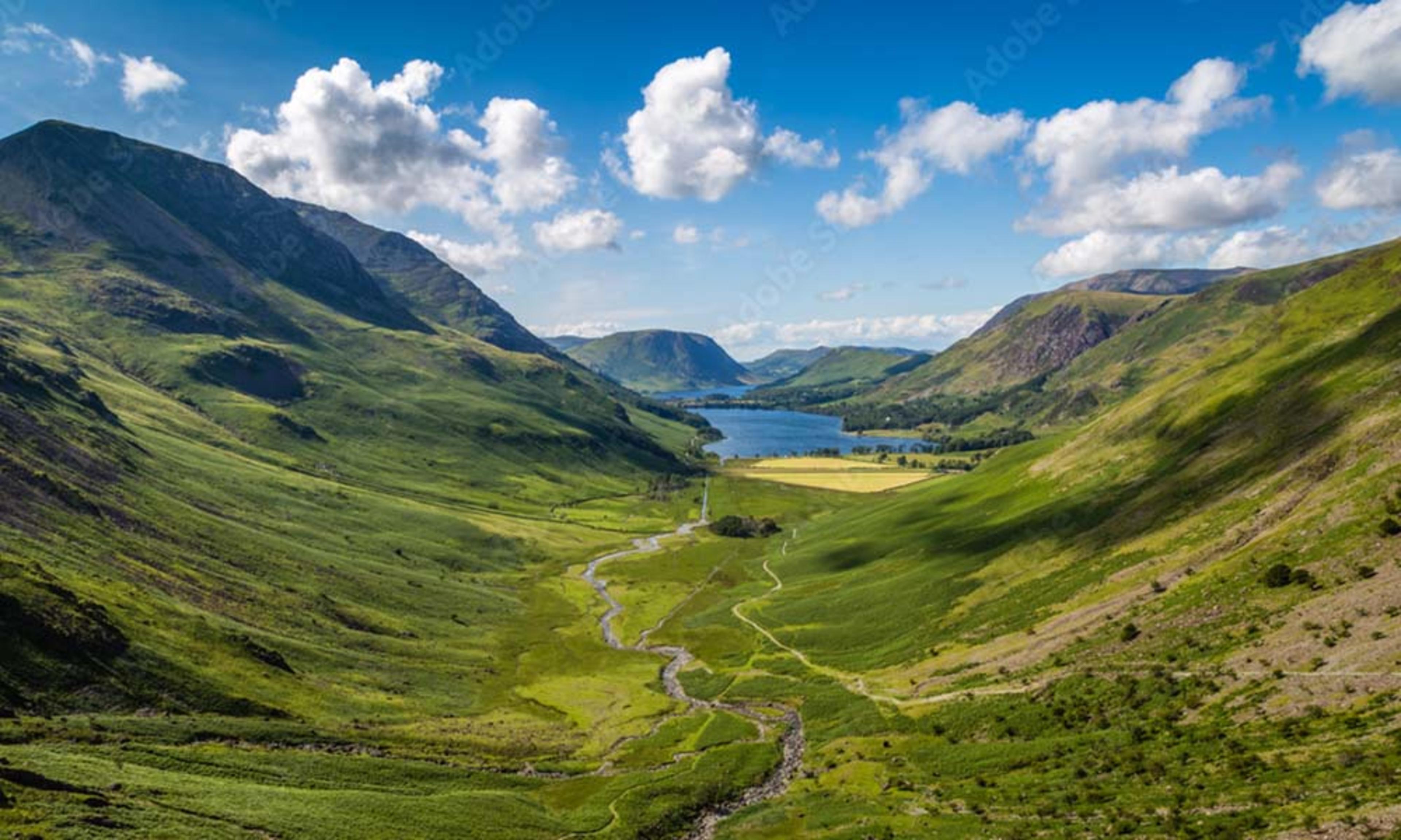 Image of Peak District, hills and lake in the background