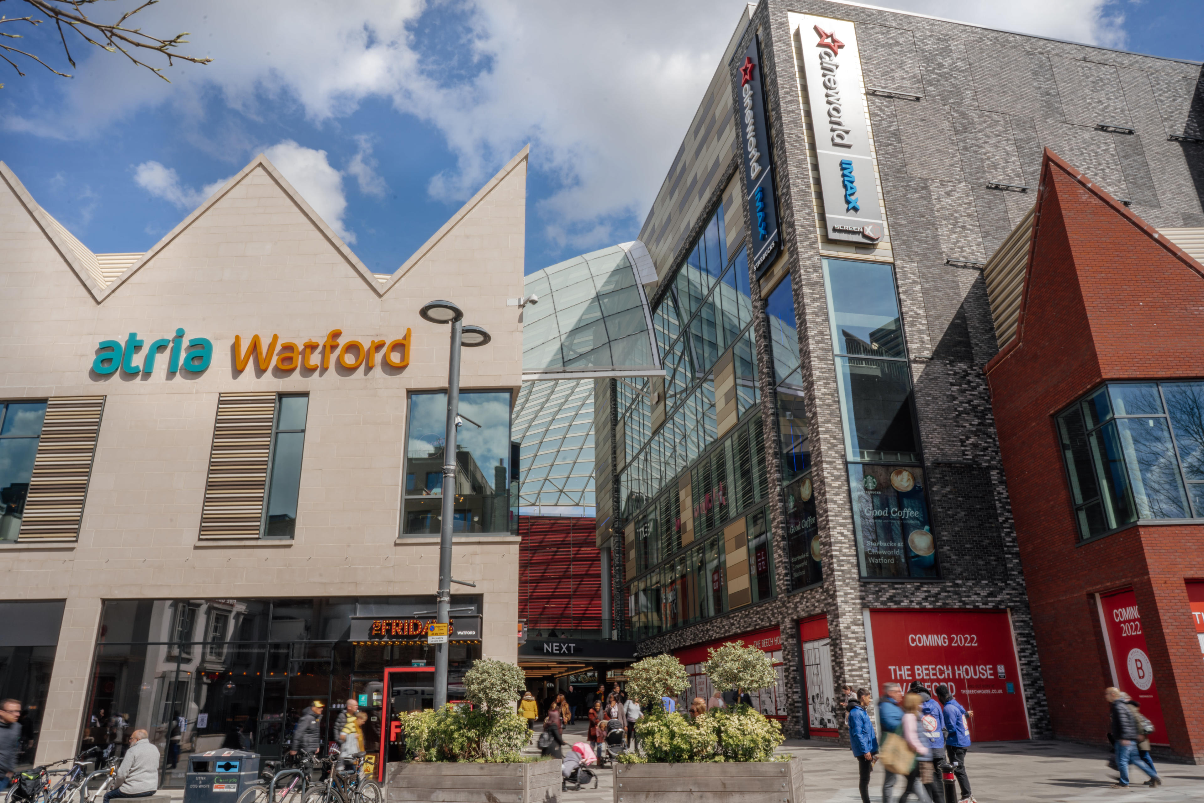 Sign saying "atria Watford" over doors to shopping mall