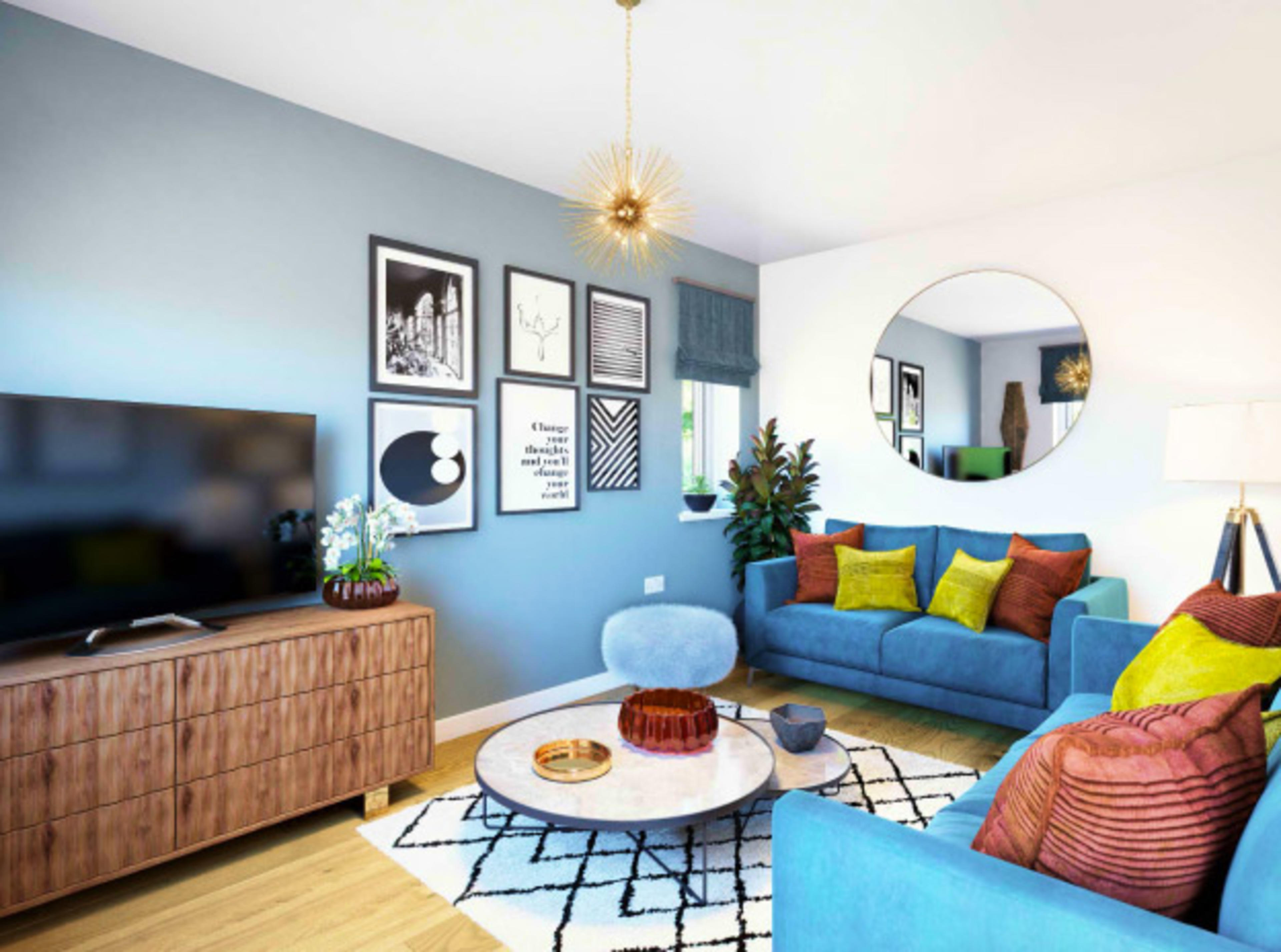 Living room with two blue sofas and flat screen TV on a media unit