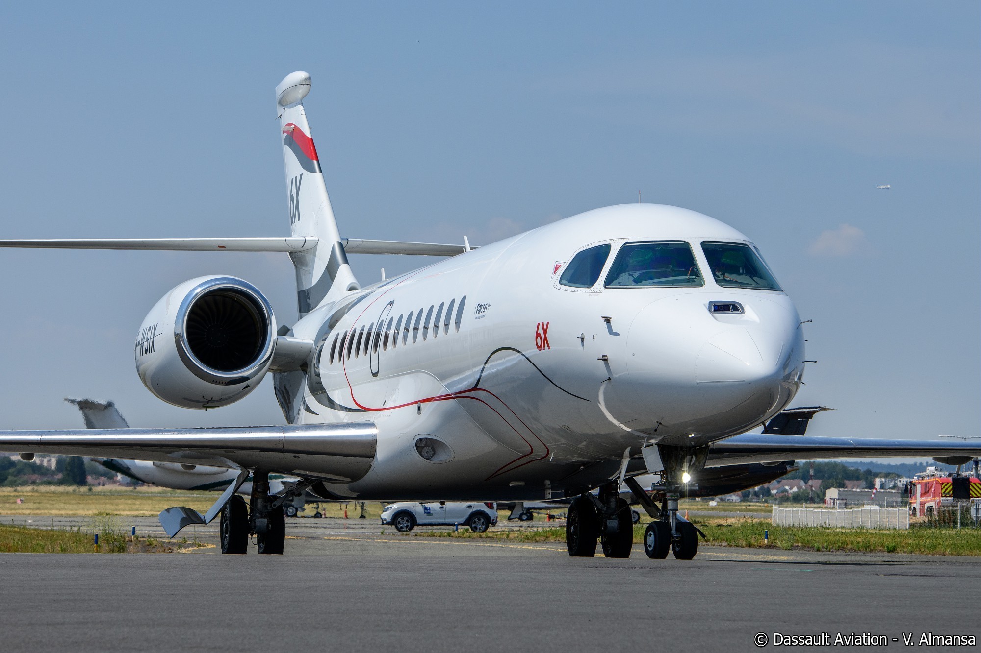 White plane taking off