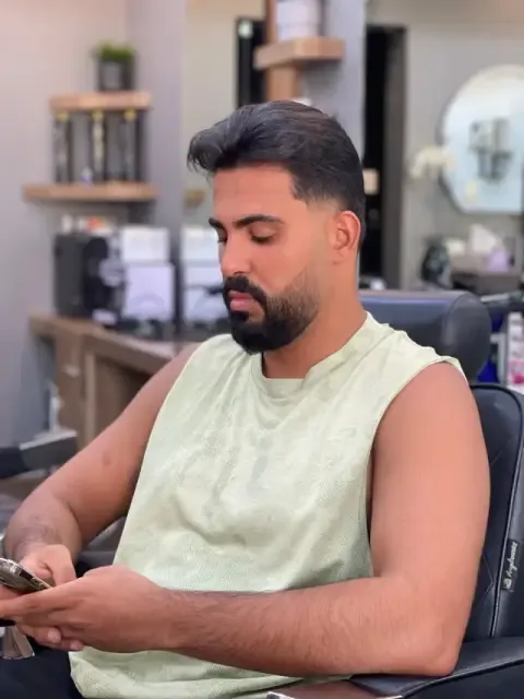 Low taper fade with beard at Barberhood, JVC Dubai