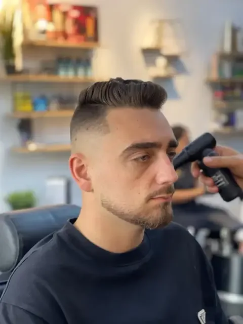 Gents haircut being styled at Barberhood, JVC Dubai