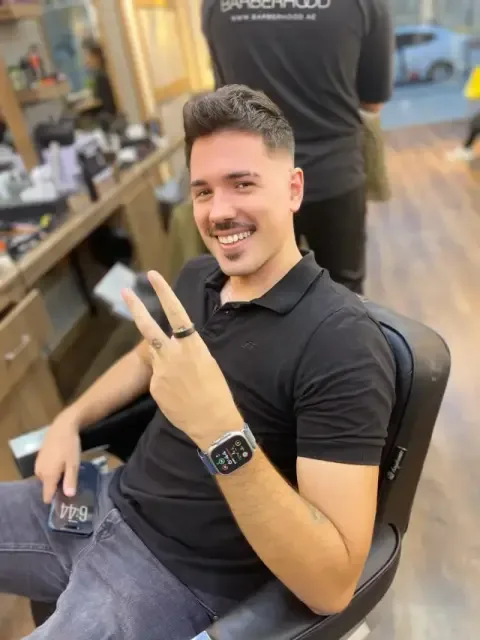 Client with a fresh haircut at Barberhood, JVC Dubai