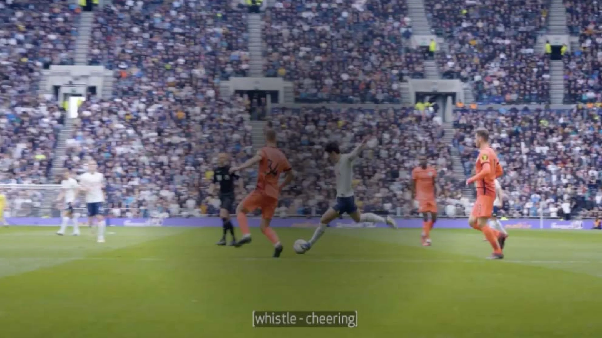 Video grab of Tottenham Hotspur playing football within stadium