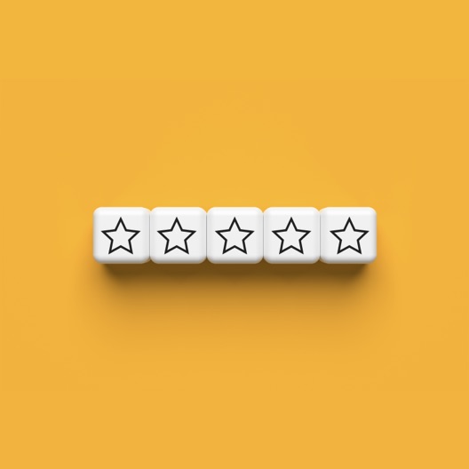  Ratings Star Dices on Yellow Background (medium)