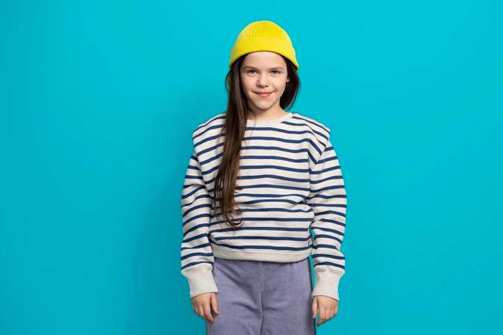 Smiling little girls looking at camera (single block)