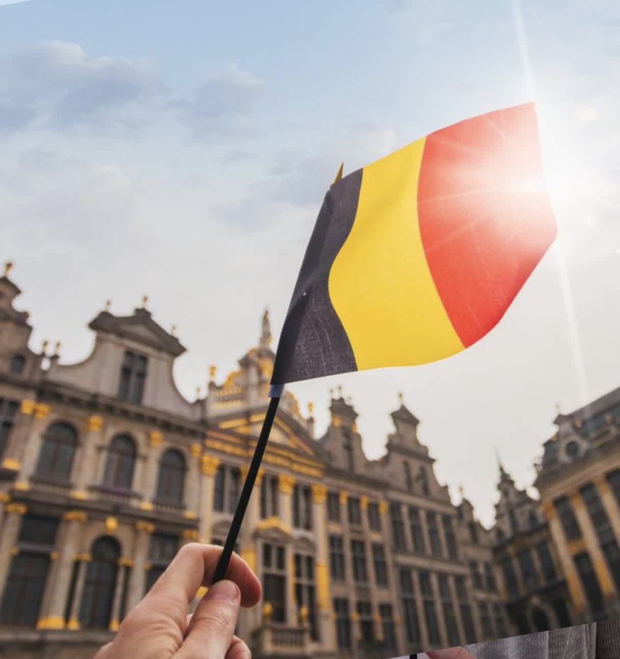 A Belgian flag over the Grand-Place in Brussels