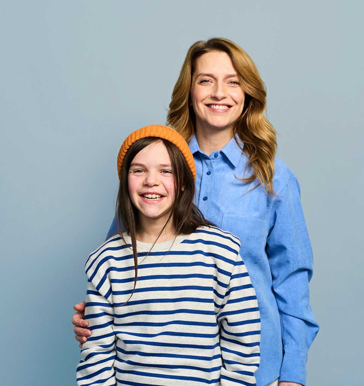 topblock-mother-and-daughter-smiling