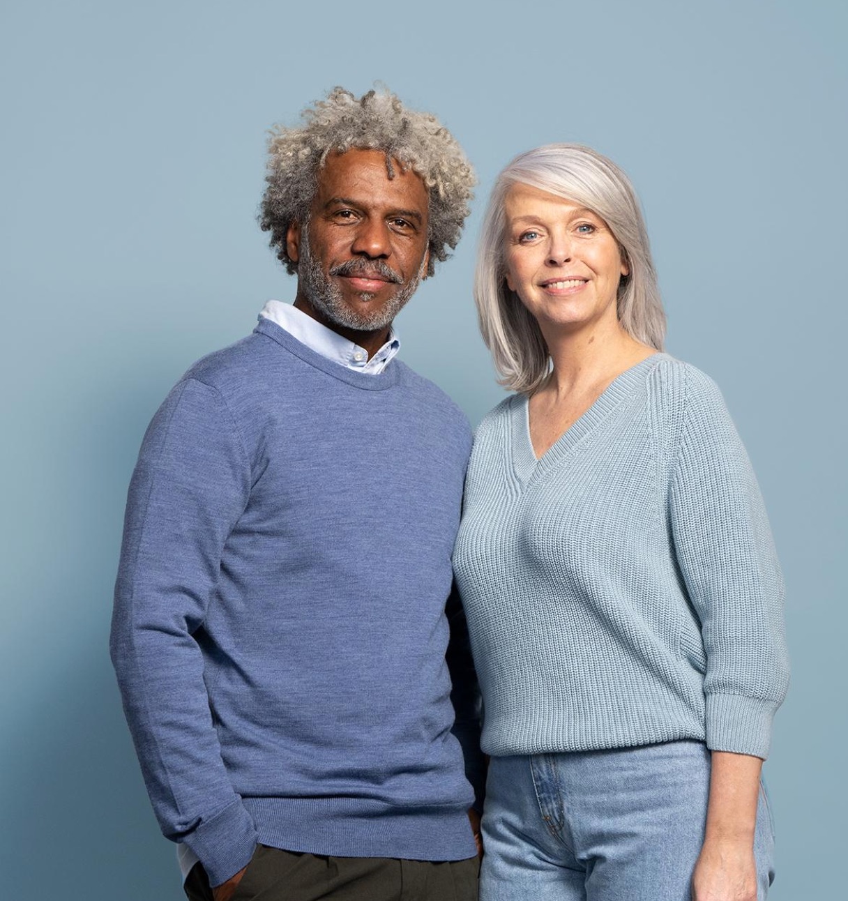 topblock-senior-couple-smiling-at-camera