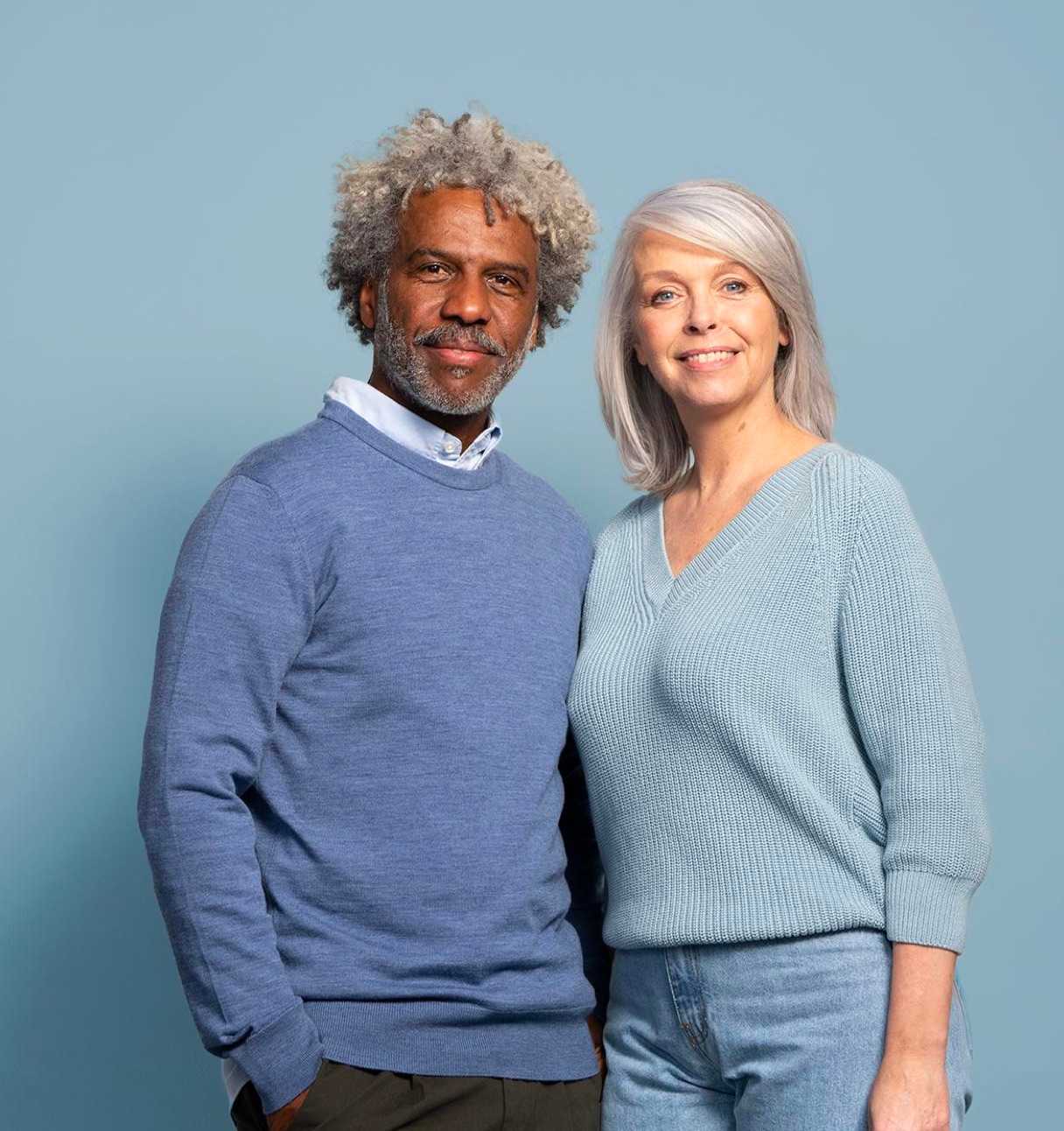 topblock-senior-couple-smiling-at-camera