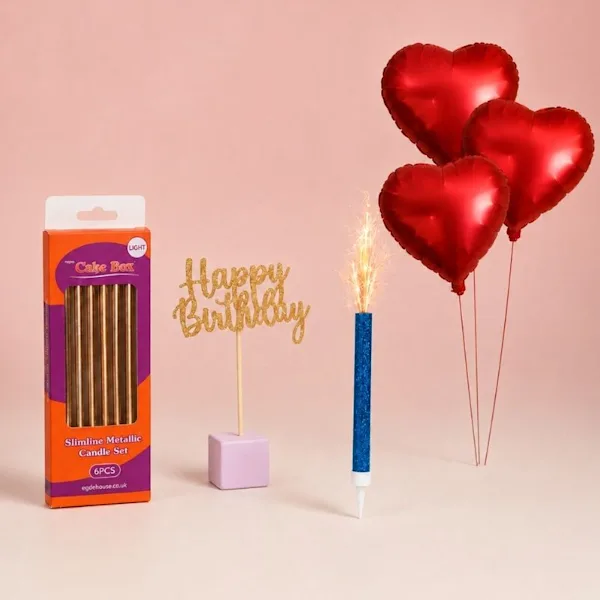 Party accessories at cake box