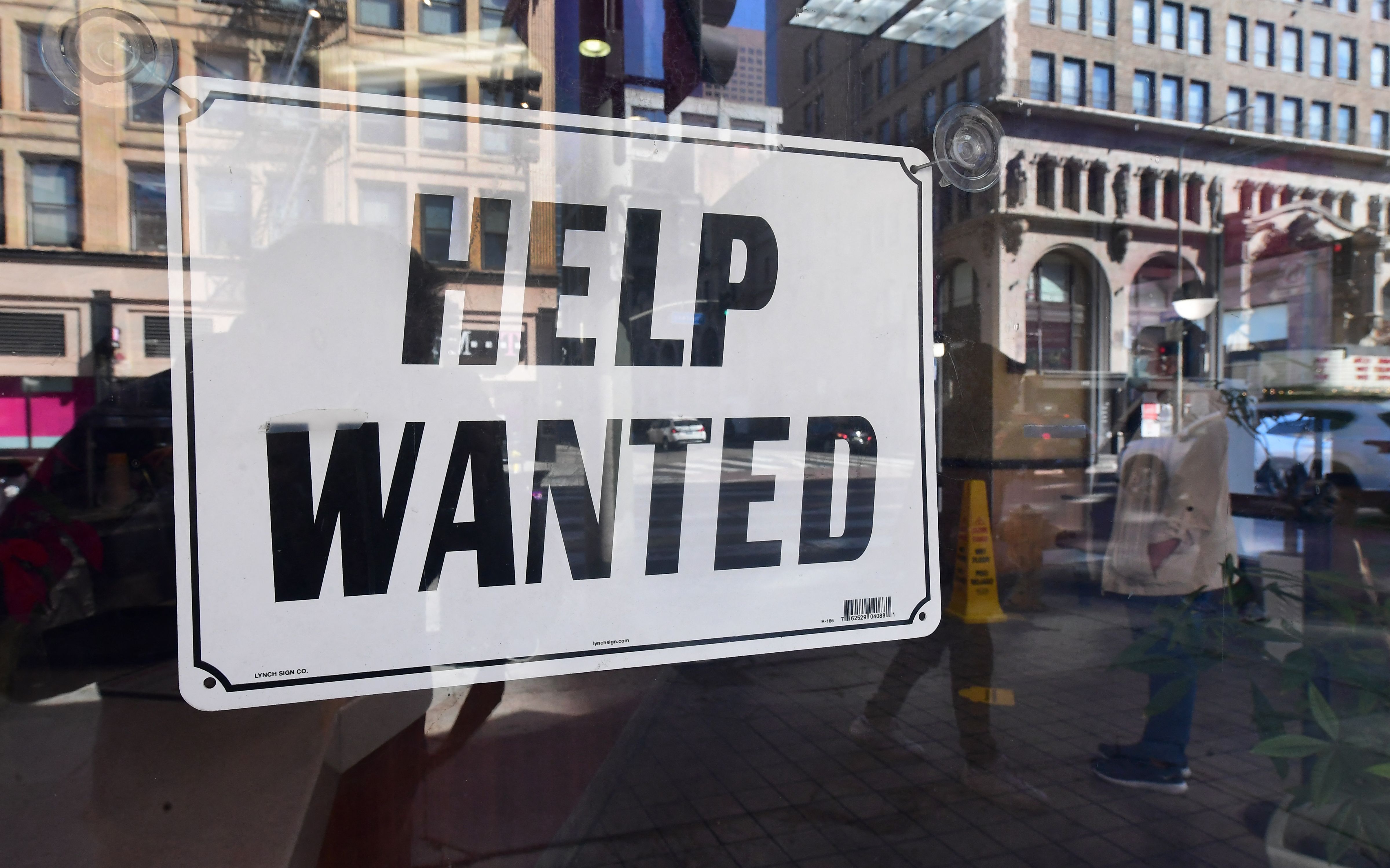 The U.S. economy added hundreds of thousands of jobs last month, despite tech layoffs galore. (FREDERIC J. BROWN / Contributer / Getty Images)