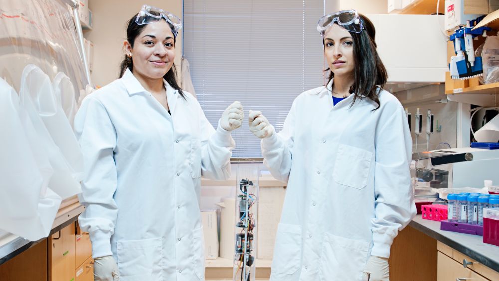 Mariana Matus, Biobot co-founder and CEO, on the left next to Newsha Ghaeli, Biobot co-founder and president, in the lab. Courtesy of Biobot.