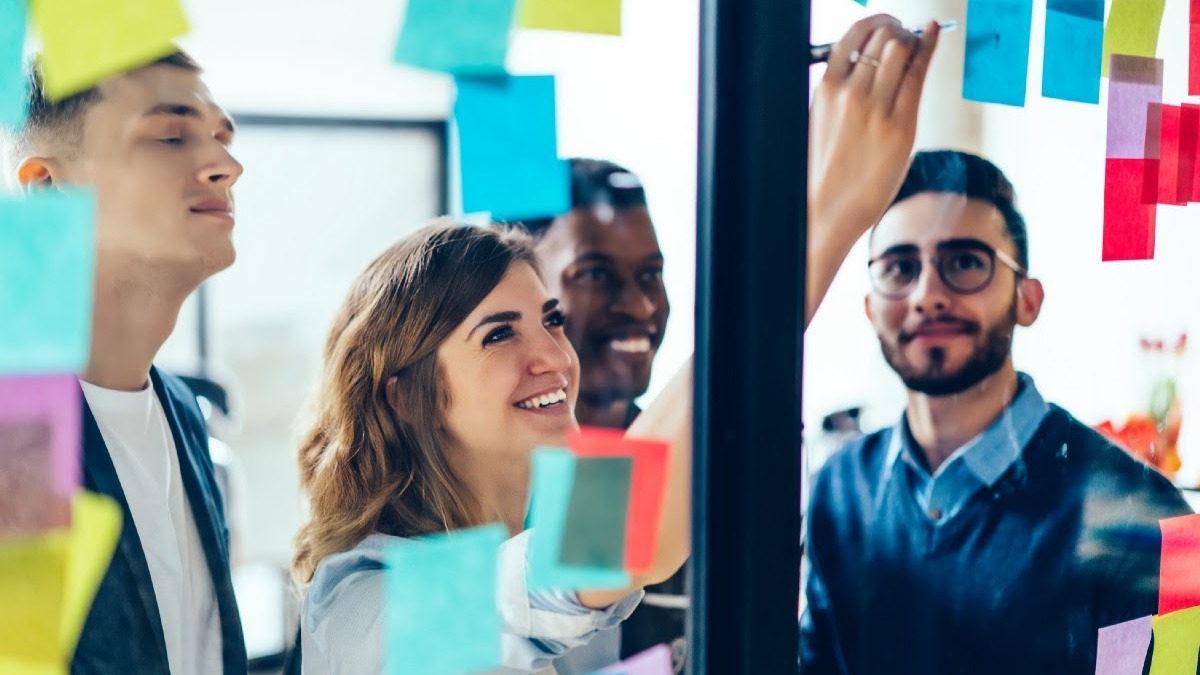 Business Analysts discussing latest requirements. Image courtesy of GaudiLab, Shutterstock
