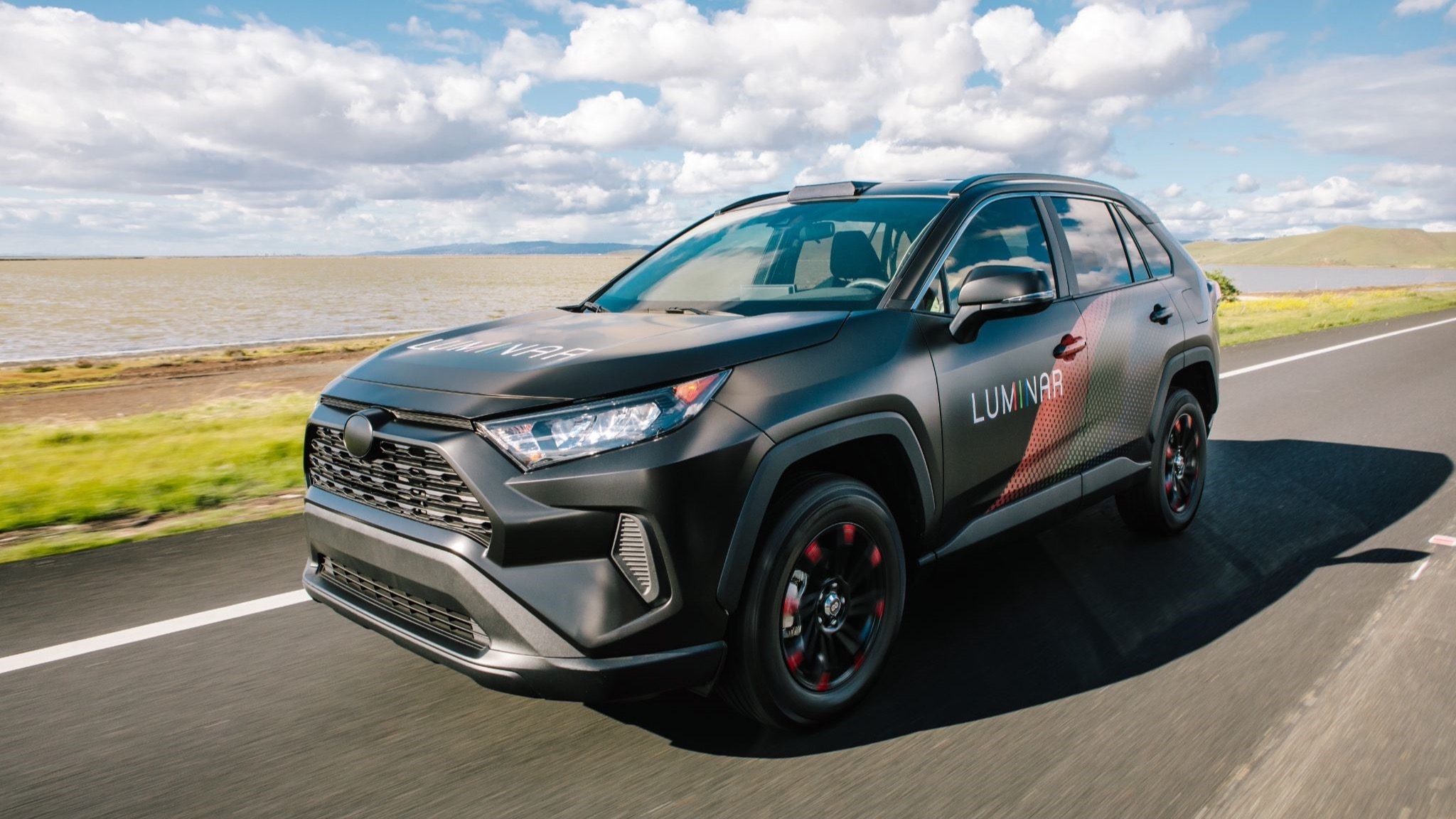 Luminar’s Iris integrated into the roofline of a passenger vehicle that is kicking off on a roadshow in NYC. (Photo: Business Wire)