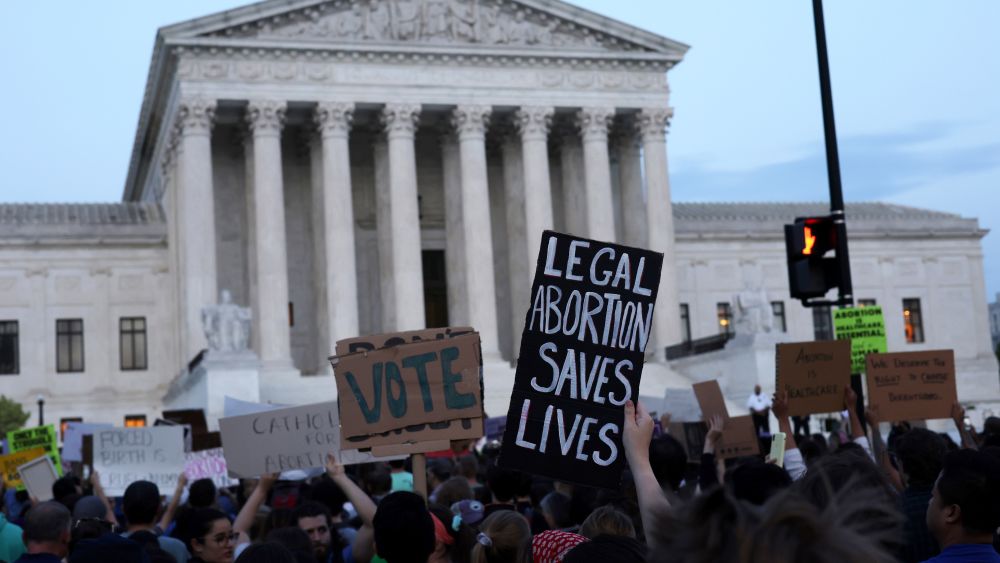 Protestors gathered by the Supreme Court in D.C. last week after Politico published a draft opinion by the court that could overturn Roe v. Wade. (Photo by Alex Wong/Getty Images)