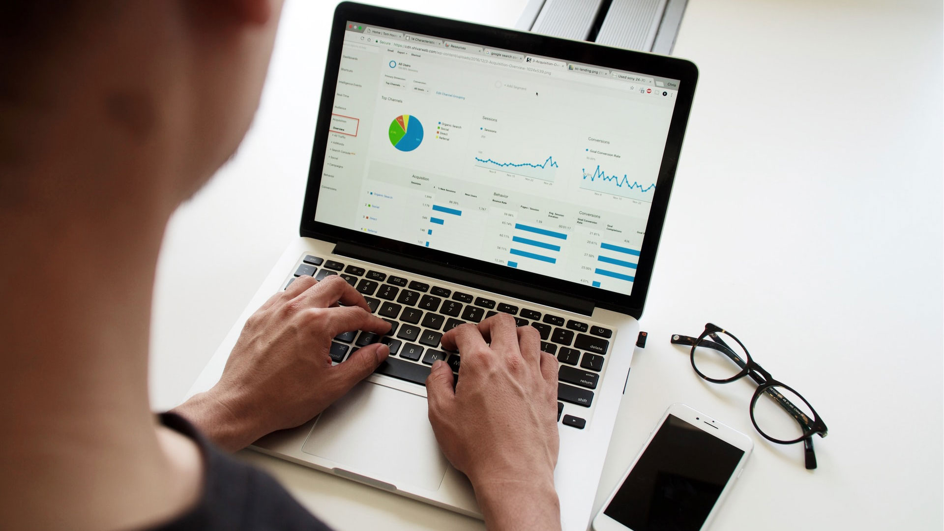 Data Analyst looking at an analytics dashboard