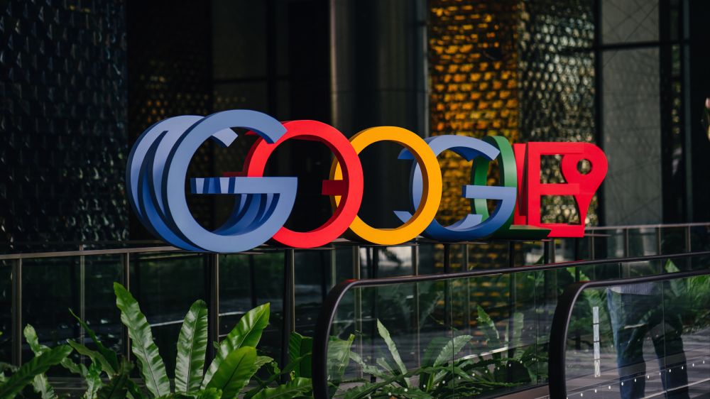 Google logo in the lobby of its office in Singapore. Editorial credit: mentatdgt / Shutterstock.com