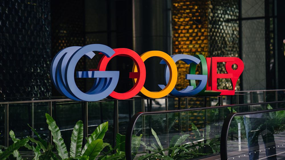 Google logo in the lobby of its office in Singapore. Editorial credit: mentatdgt / Shutterstock.com