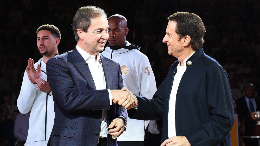 The co-executive chairman of the Golden State Warriors, Joe Lacob and Peter Guber, at a 2017 championship ring ceremony. Courtesy of nba.com. 