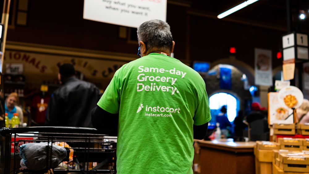 An Instacart Shopper in a store. Editorial credit: Kristi Blokhin / Shutterstock.com