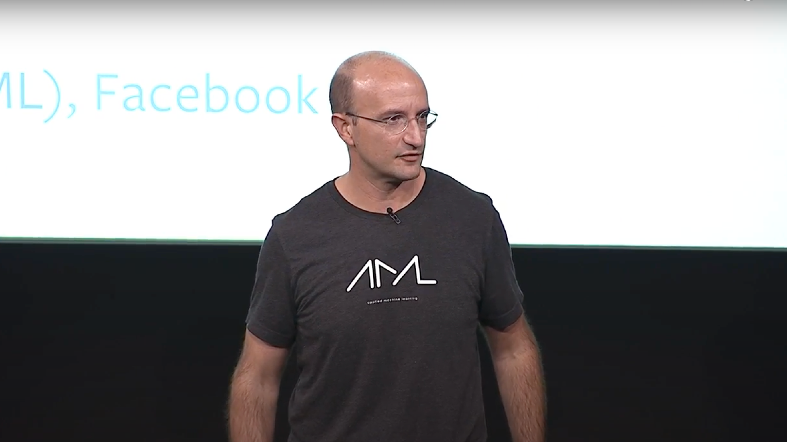 Joaquin Quiñonero Candela presenting at BayLearn 2017. Image courtesy of BayLearn via YouTube