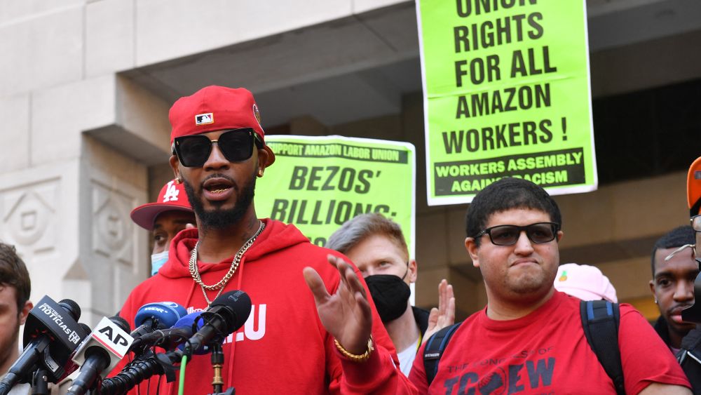 Union organizer Christian Smalls speaks following the April 1, 2022, vote for the unionization of the Amazon Staten Island warehouse in New York. The union reportedly faced "captive audience" meetings and other anti-union tactics from management. (Photo by Andrea RENAULT / AFP) (Photo by ANDREA RENAULT/AFP via Getty Images)