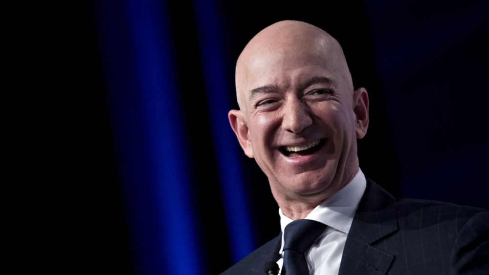 Amazon CEO Jeff Bezos laughs at a discussion at the Air Force Association’s Air, Space and Cyber Conference in December 2020. Editorial credit: Christos S / Shutterstock.com