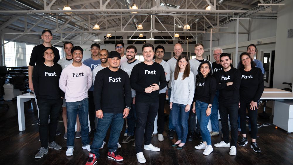 Fast Co-founders Domm Holland and Allison Barr Allen with some of their team at Fast HQ. Courtesy of Fast. 