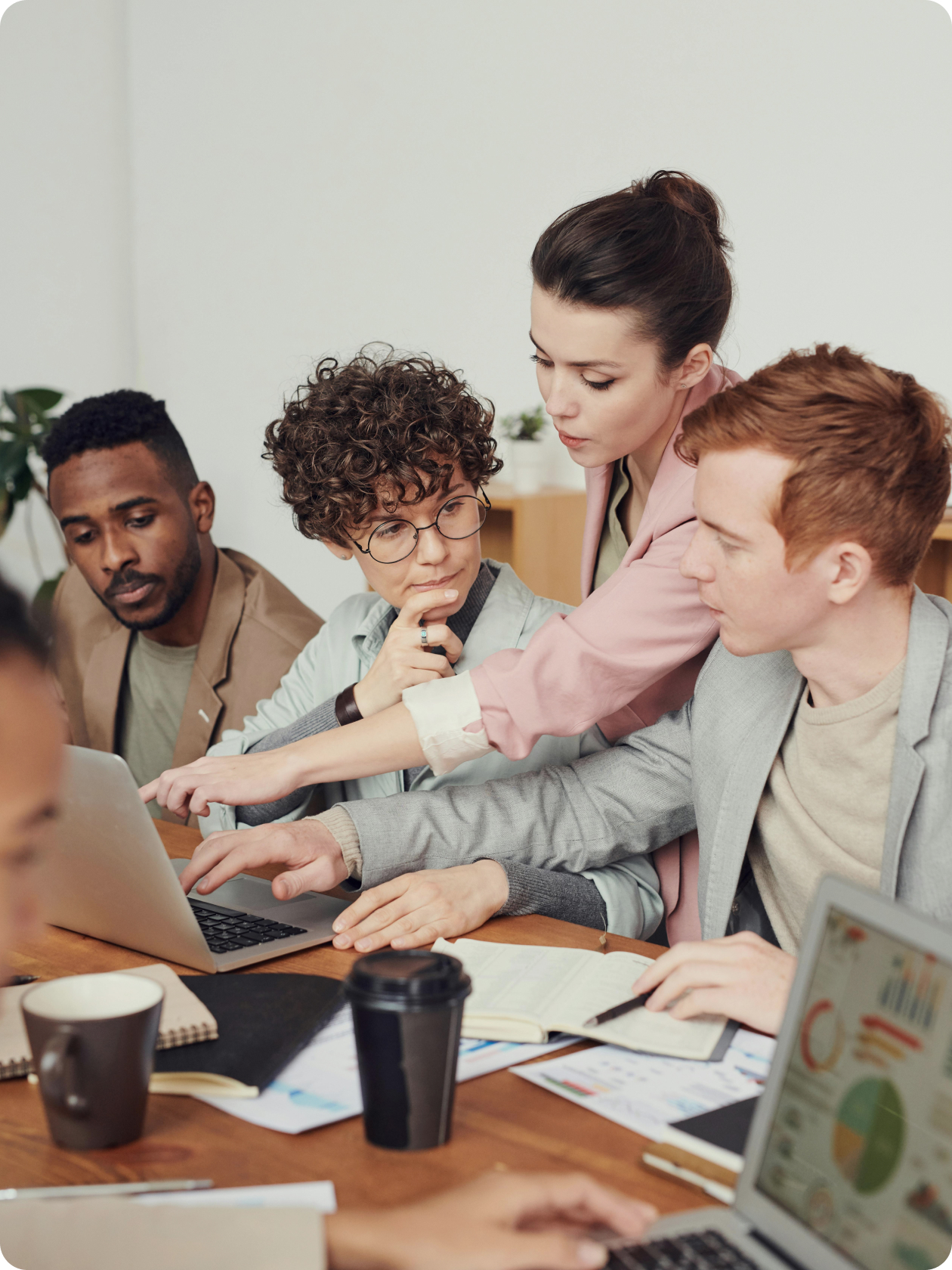 Image of people at a desk