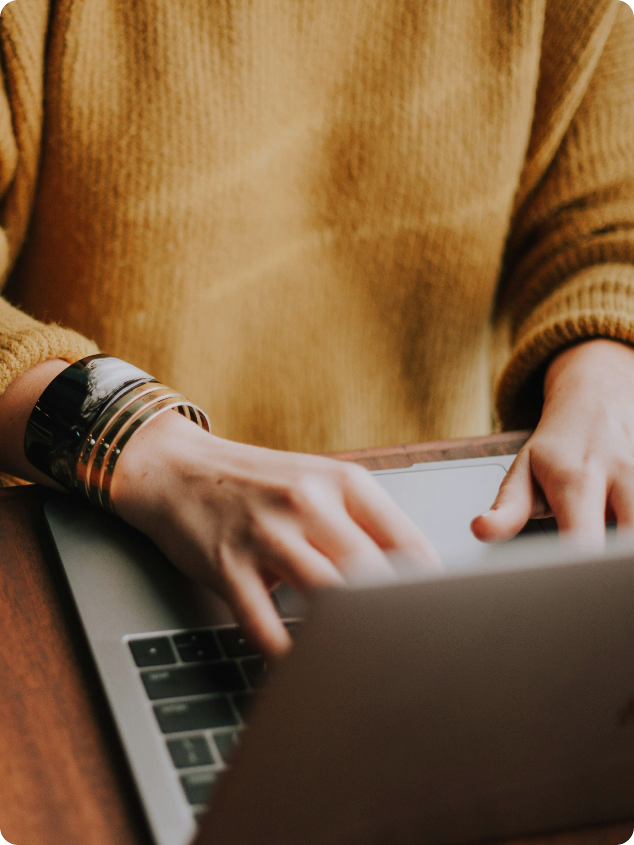 Image of person at laptop