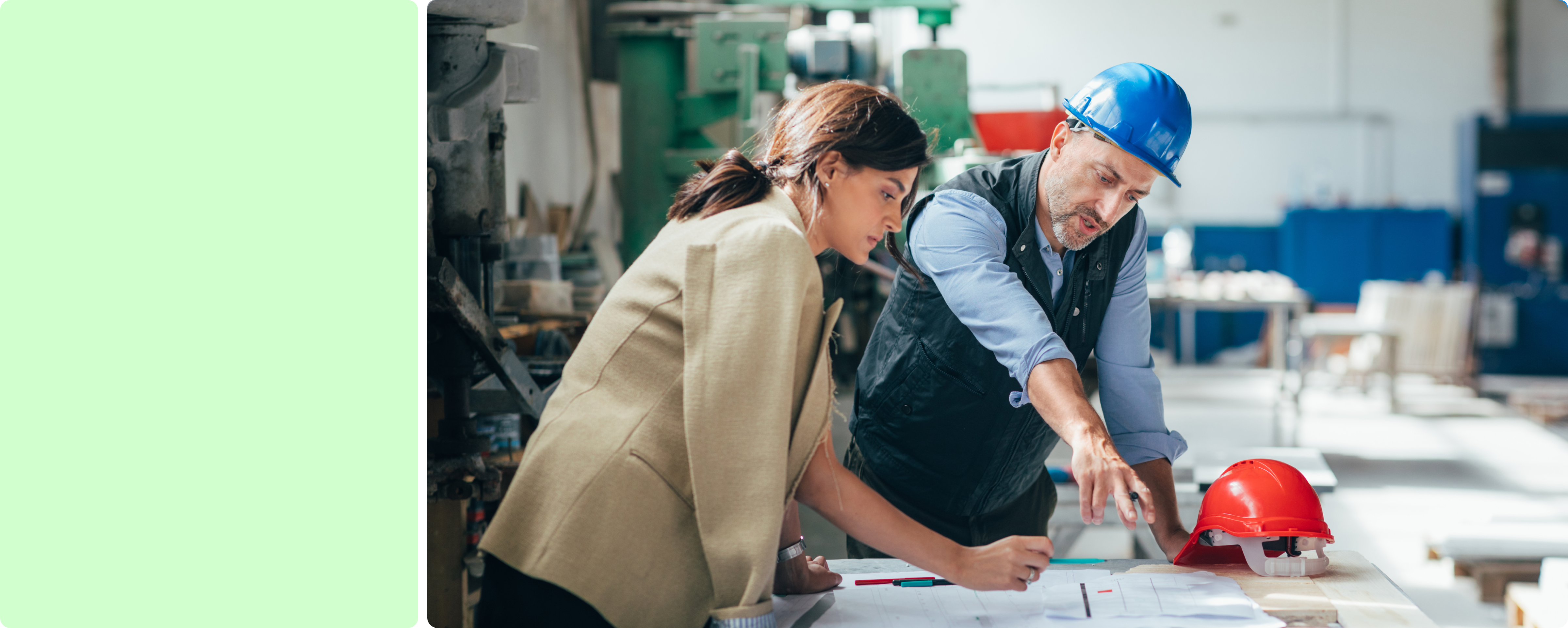 Image of two people in a factory