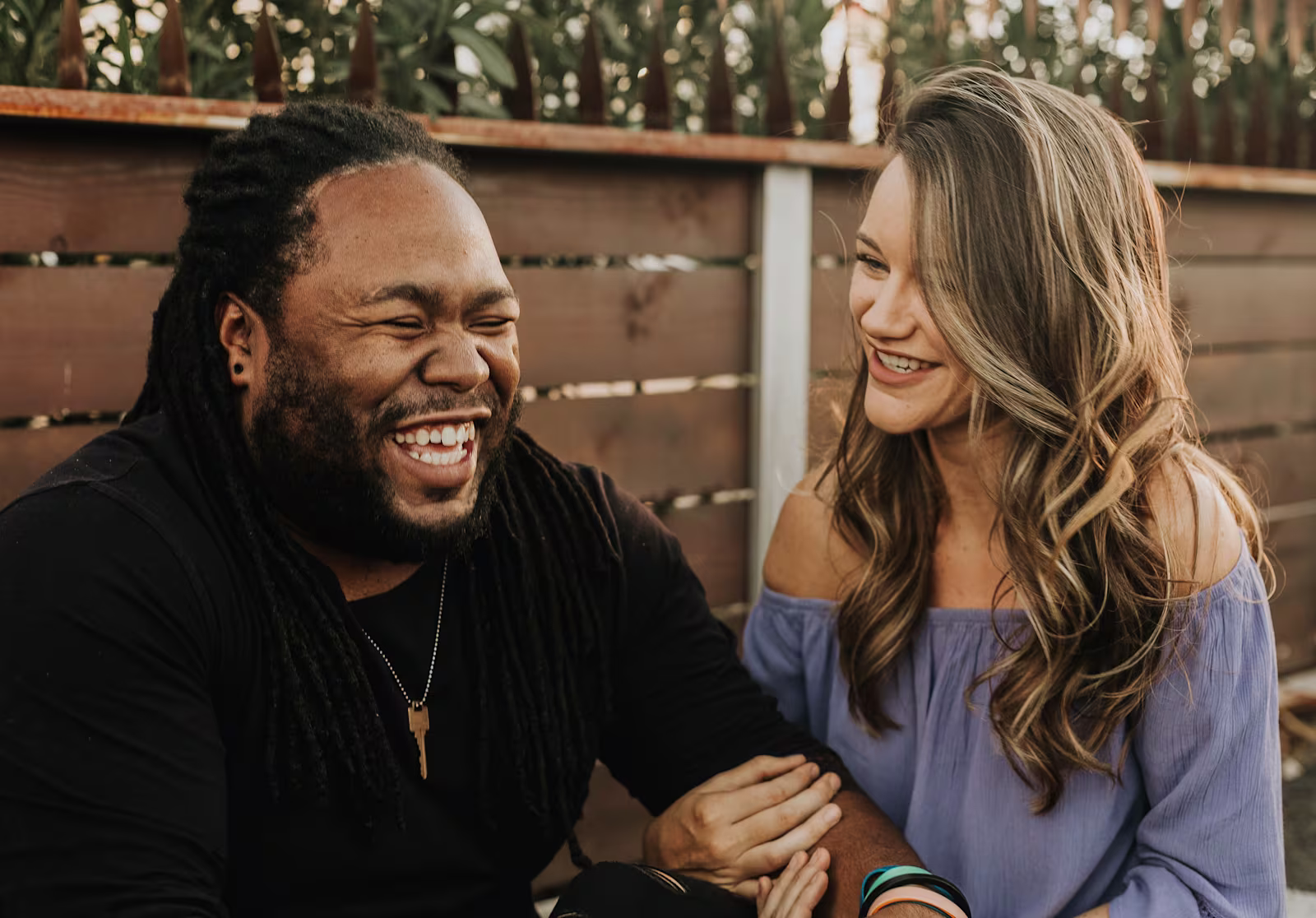 Man and Woman Laughing Together