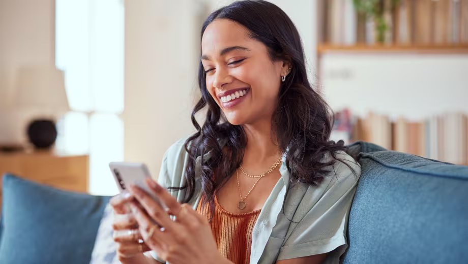welcome-digital-hero-2 woman securely sending money overseas on mobile phone