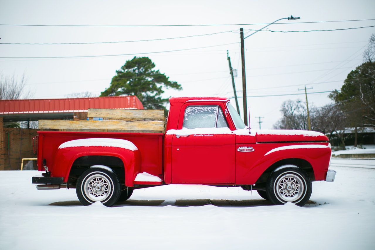 red truck in the snow