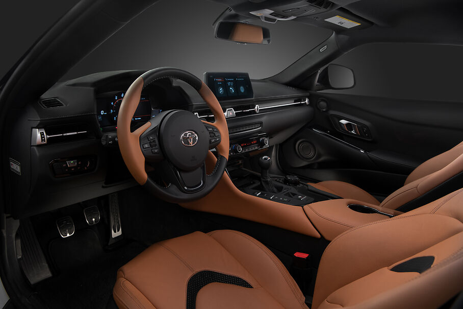 the wheel and dashboard of a 2023 Supra