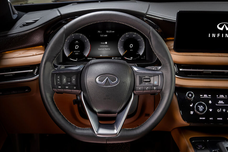 the wheel and dashboard of a 2022 Infiniti QX60