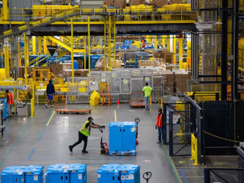 Amazon raising hourly pay for warehouse and delivery workers