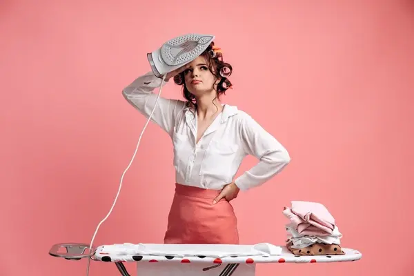 tired-housewife-ironing-clothes-on-600nw-1942198366