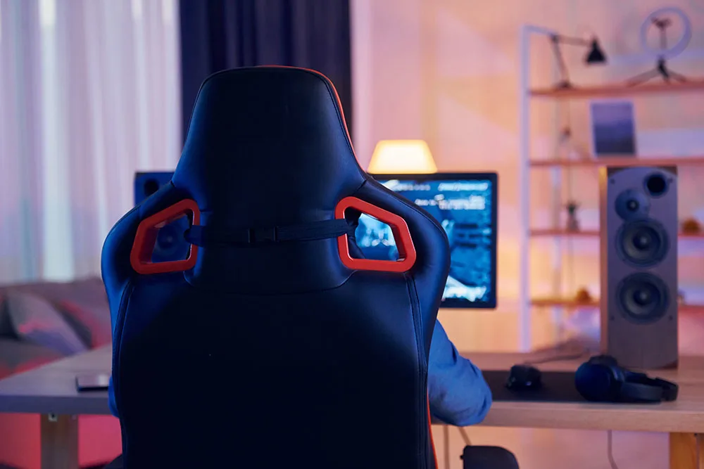 sitting-on-the-chair-online-streamer-playing-fps-2023-11-27-05-16-56-utc