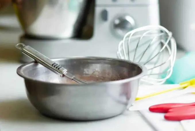 Manueel melk opschuimen