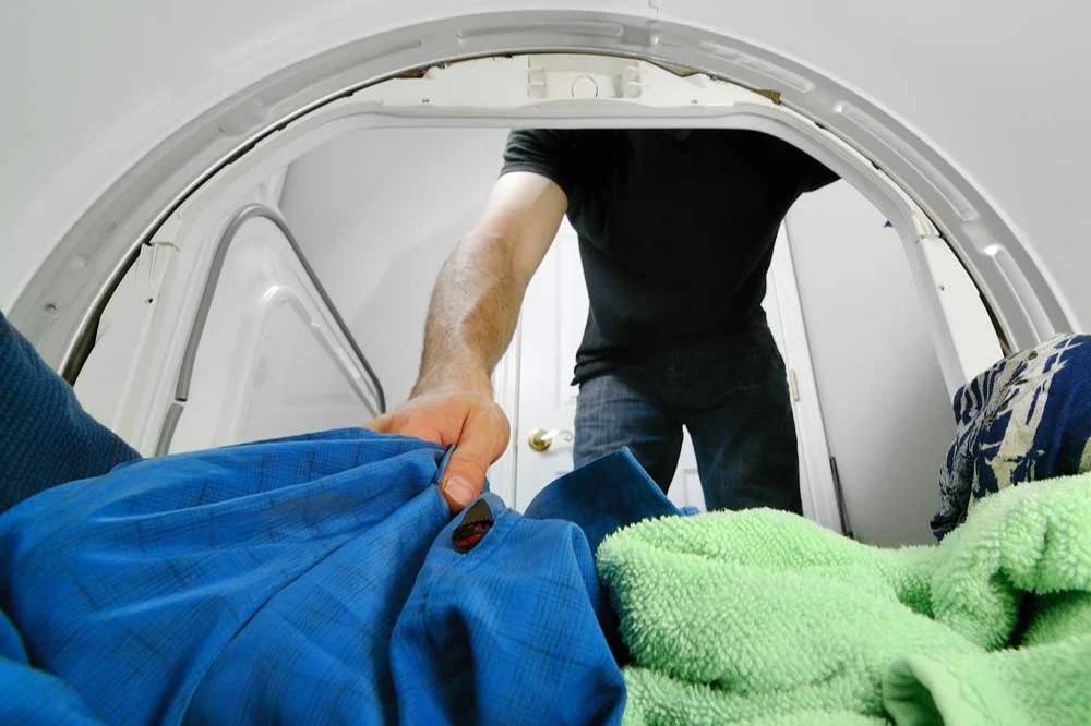 Kledij in wasmachine