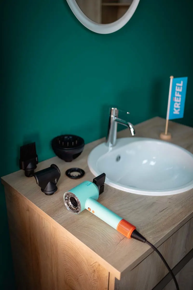 De Dyson Supersonic Nural föhn en opzetstukken