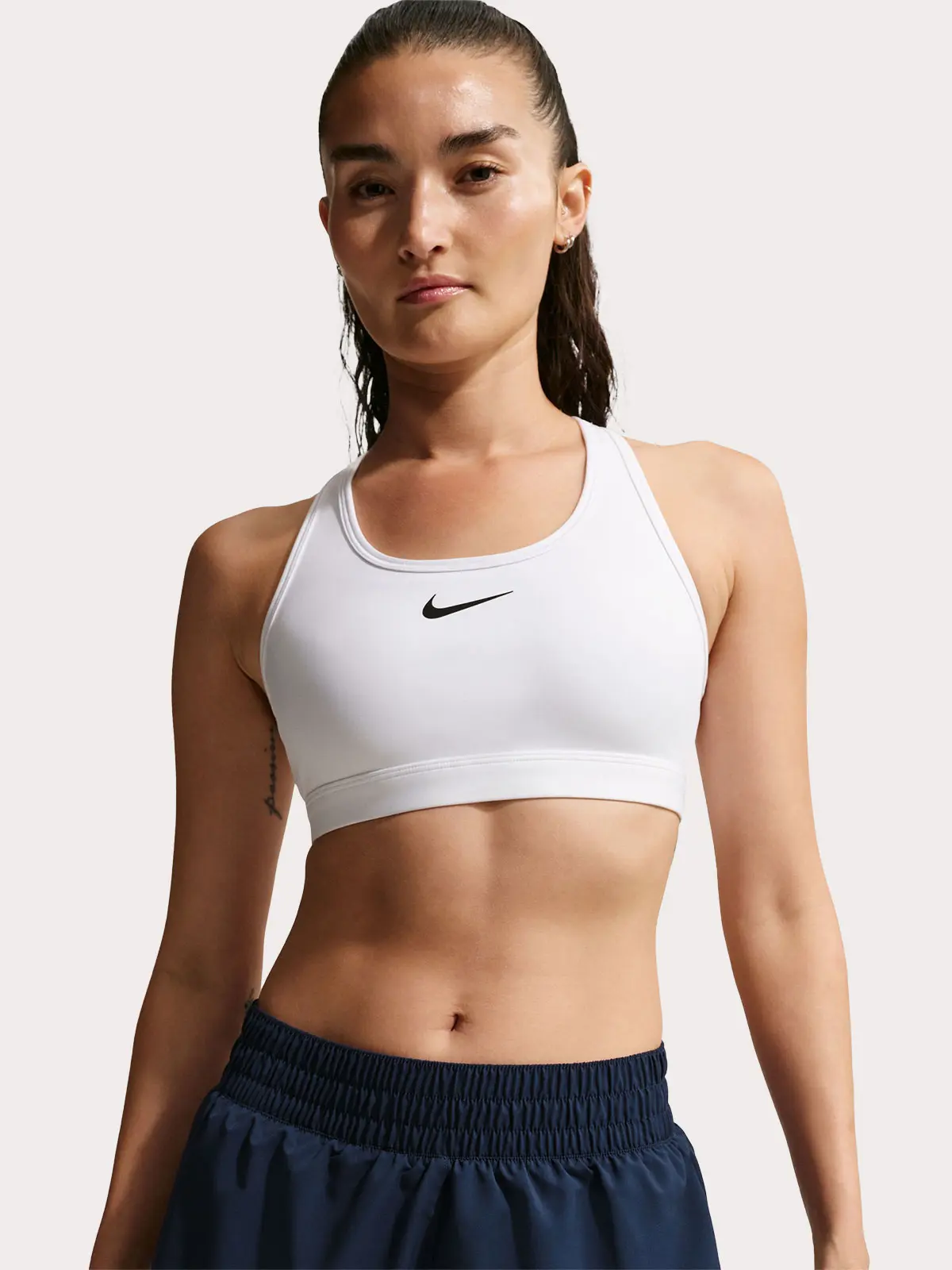 Woman wearing white sports bra