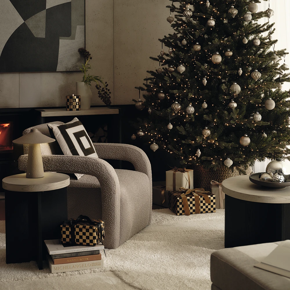 Festive lounge scene decorated with M&S x Kelly Hoppen homeware